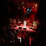 Elvis impersonator JD King on stage with band at KoKo Club, London